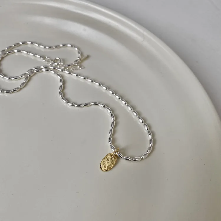 Gold And Silver Love Necklace Rice Olive Beads 925 Sterling Silver Niche Design Clavicle Chain Women's High-end Silver Ornaments display picture 20