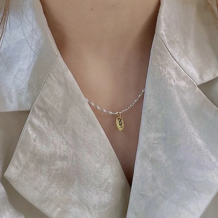 Gold And Silver Love Necklace Rice Olive Beads 925 Sterling Silver Niche Design Clavicle Chain Women's High-end Silver Ornaments display picture 23