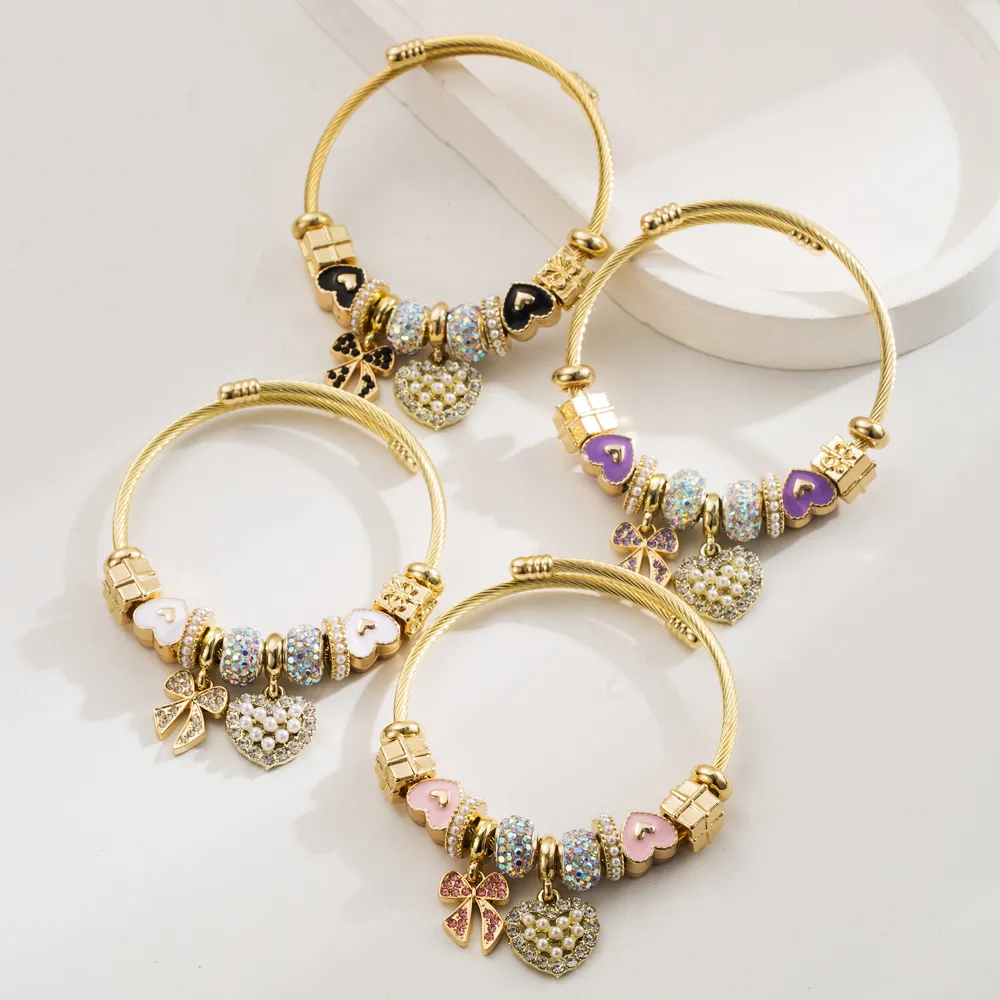 Simple Style Classic Style Commute Heart Shape Bow Knot Alloy Beaded Inlay Rhinestones Pearl Beads K Gold Plated Women's Bangle display picture 2