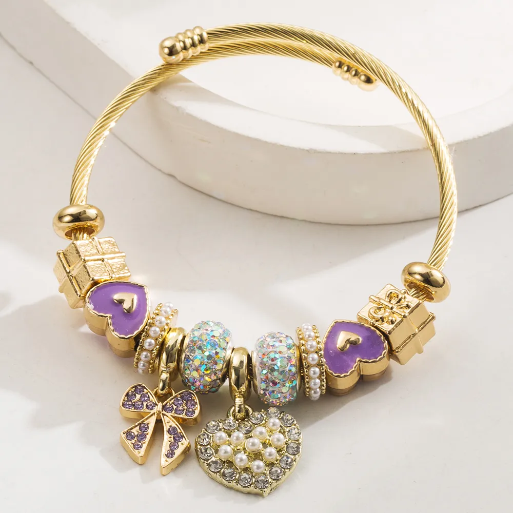 Simple Style Classic Style Commute Heart Shape Bow Knot Alloy Beaded Inlay Rhinestones Pearl Beads K Gold Plated Women's Bangle display picture 3