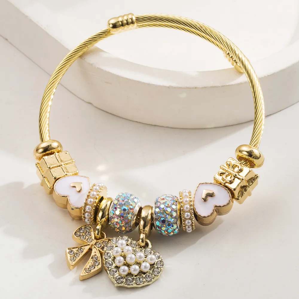 Simple Style Classic Style Commute Heart Shape Bow Knot Alloy Beaded Inlay Rhinestones Pearl Beads K Gold Plated Women's Bangle display picture 6