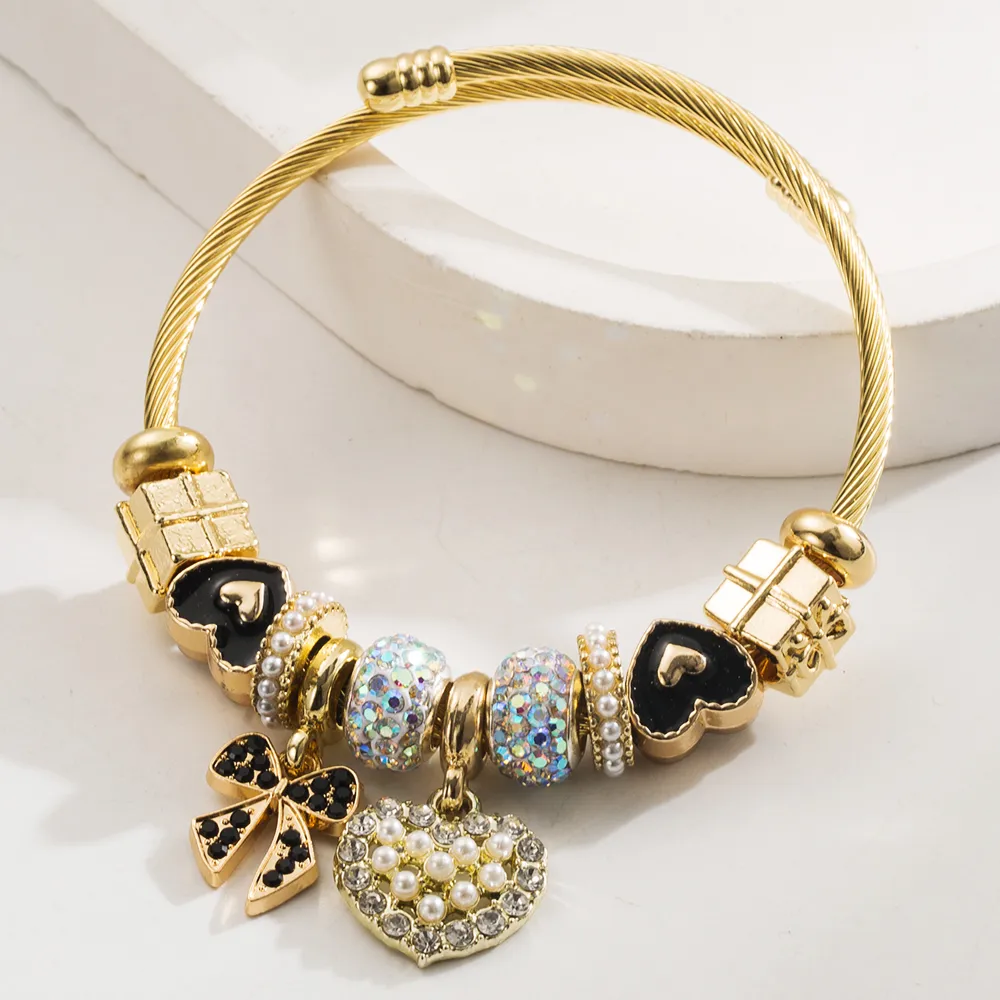 Simple Style Classic Style Commute Heart Shape Bow Knot Alloy Beaded Inlay Rhinestones Pearl Beads K Gold Plated Women's Bangle display picture 4