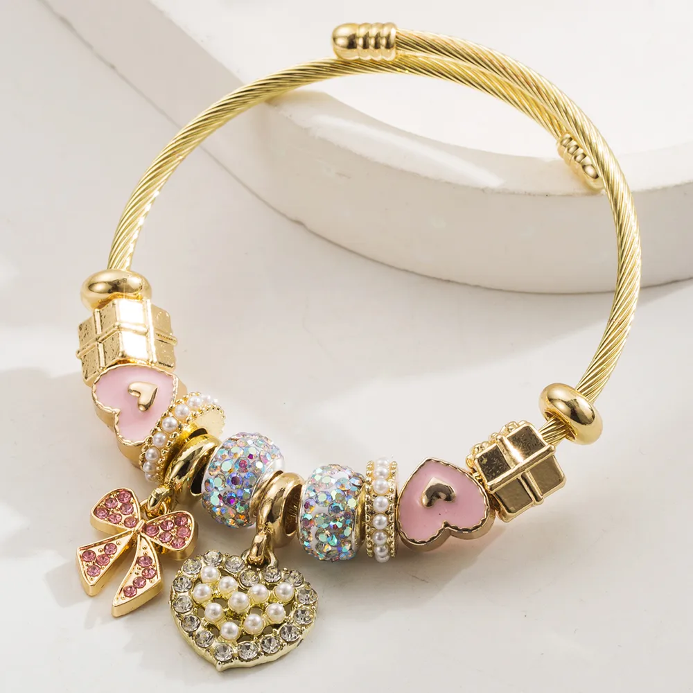 Simple Style Classic Style Commute Heart Shape Bow Knot Alloy Beaded Inlay Rhinestones Pearl Beads K Gold Plated Women's Bangle display picture 5