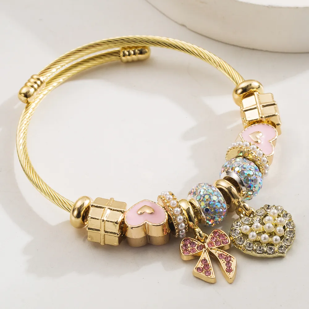 Simple Style Classic Style Commute Heart Shape Bow Knot Alloy Beaded Inlay Rhinestones Pearl Beads K Gold Plated Women's Bangle display picture 7