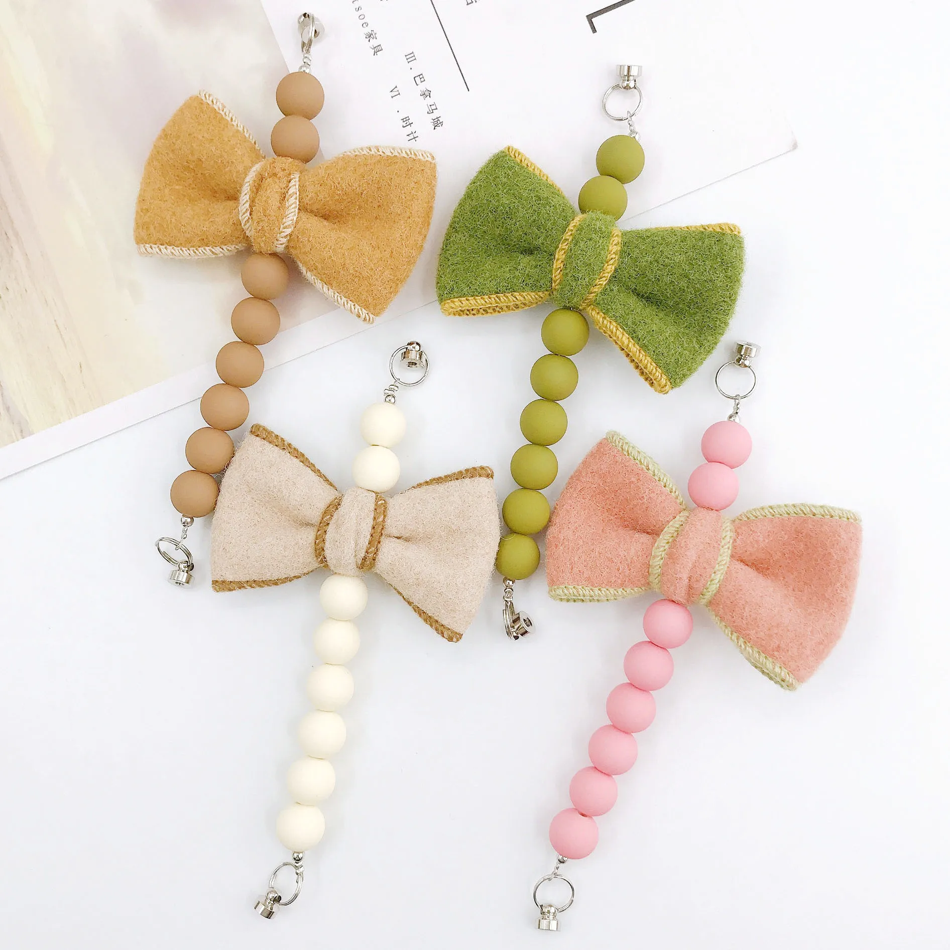 Sweet Bow Knot Arylic Spray Paint Mobile Phone Chain display picture 2