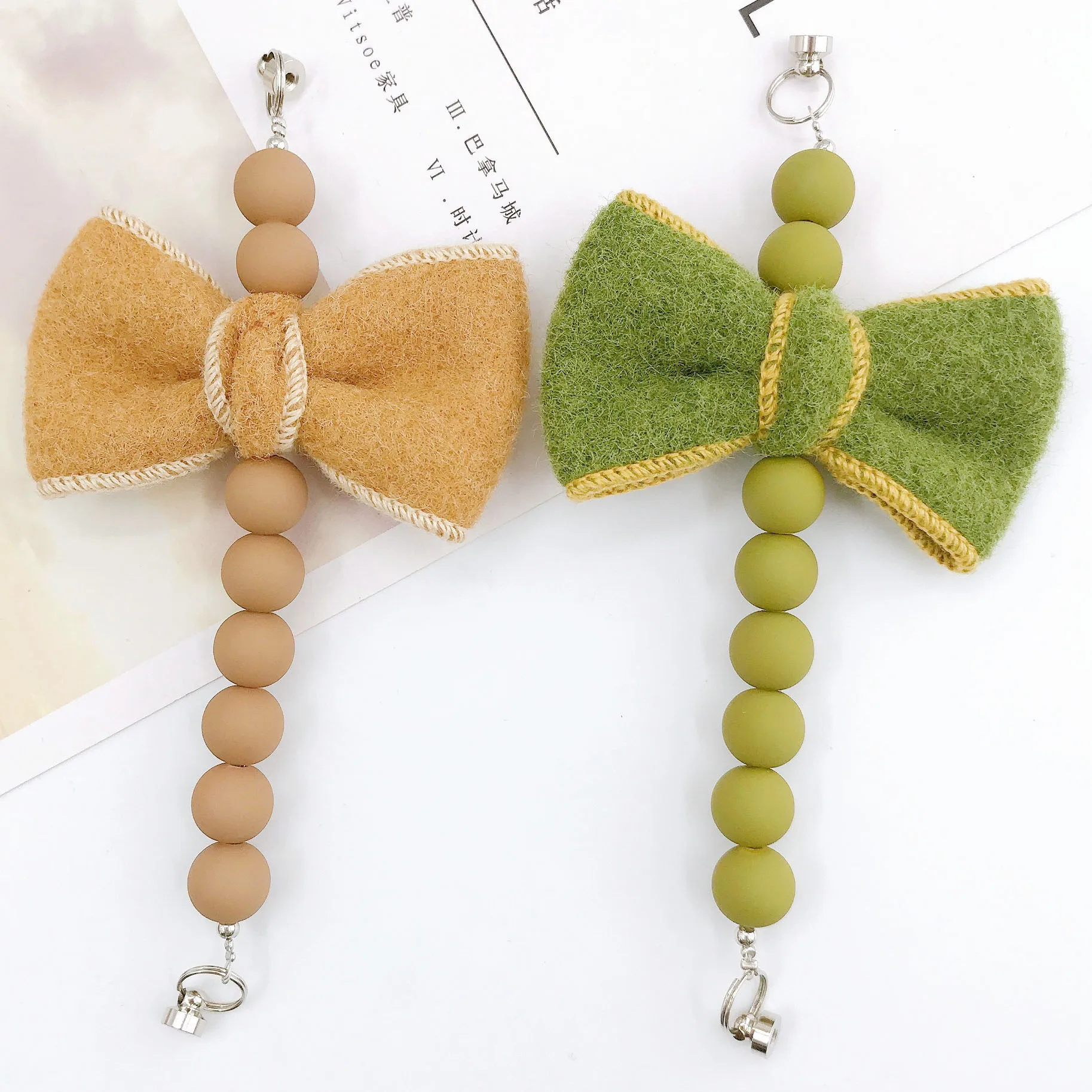 Sweet Bow Knot Arylic Spray Paint Mobile Phone Chain display picture 1