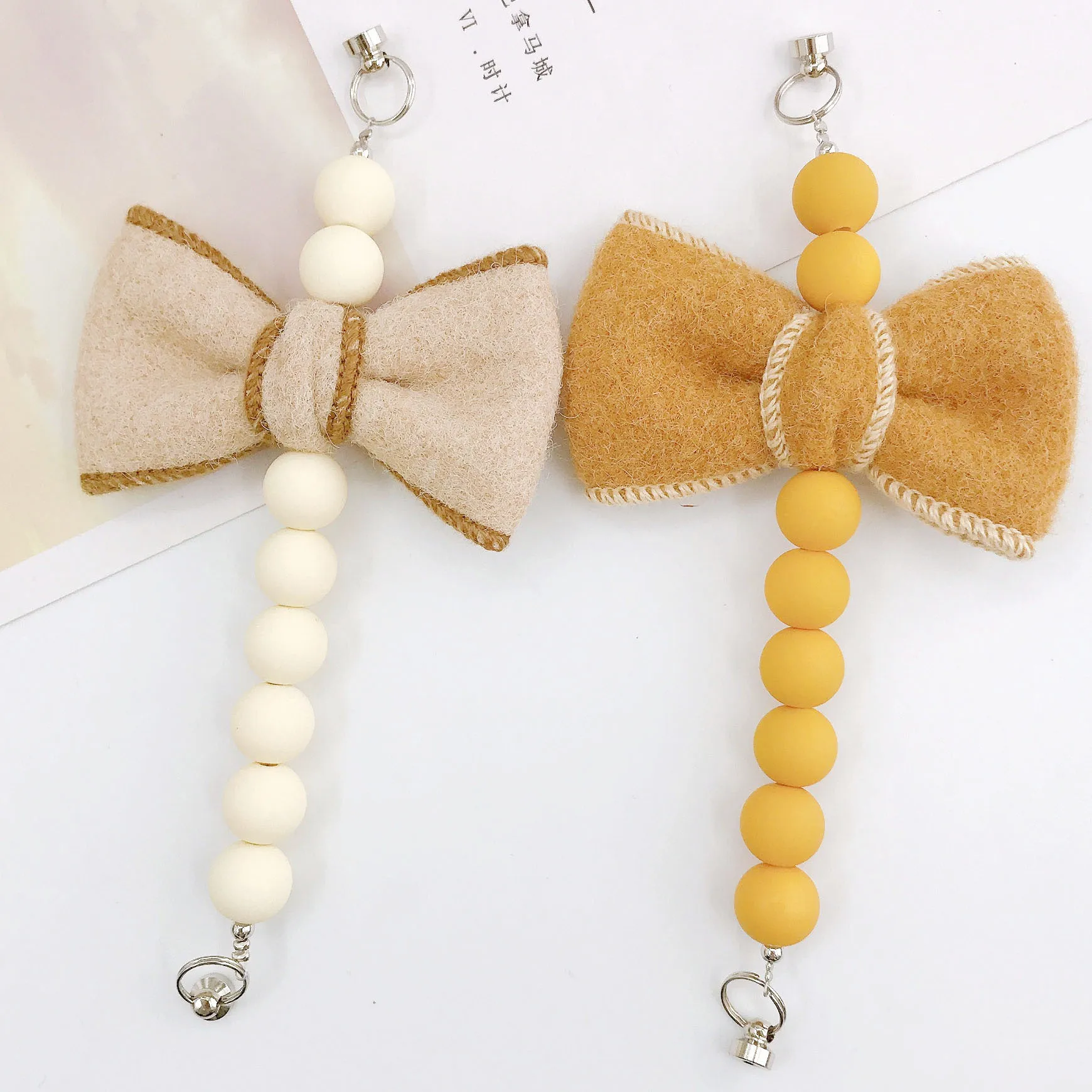 Sweet Bow Knot Arylic Spray Paint Mobile Phone Chain display picture 3