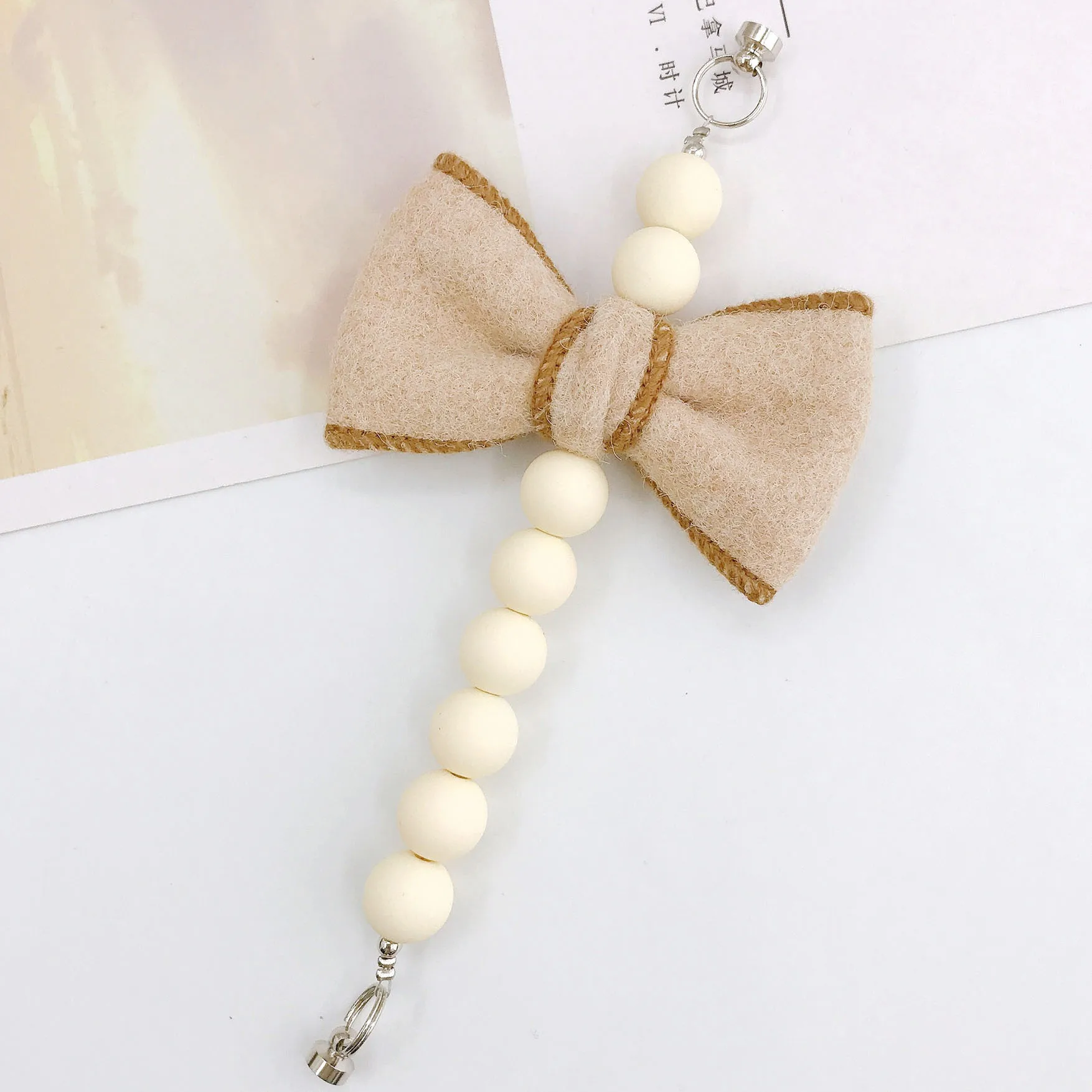 Sweet Bow Knot Arylic Spray Paint Mobile Phone Chain display picture 4