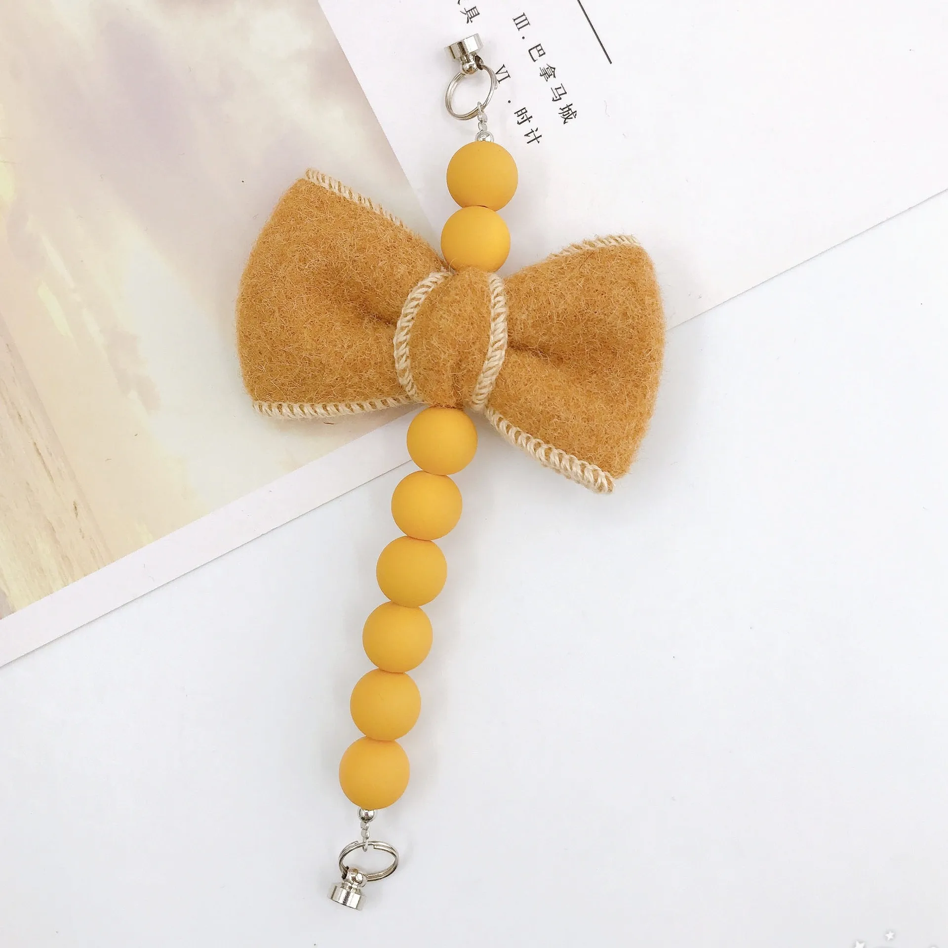 Sweet Bow Knot Arylic Spray Paint Mobile Phone Chain display picture 6