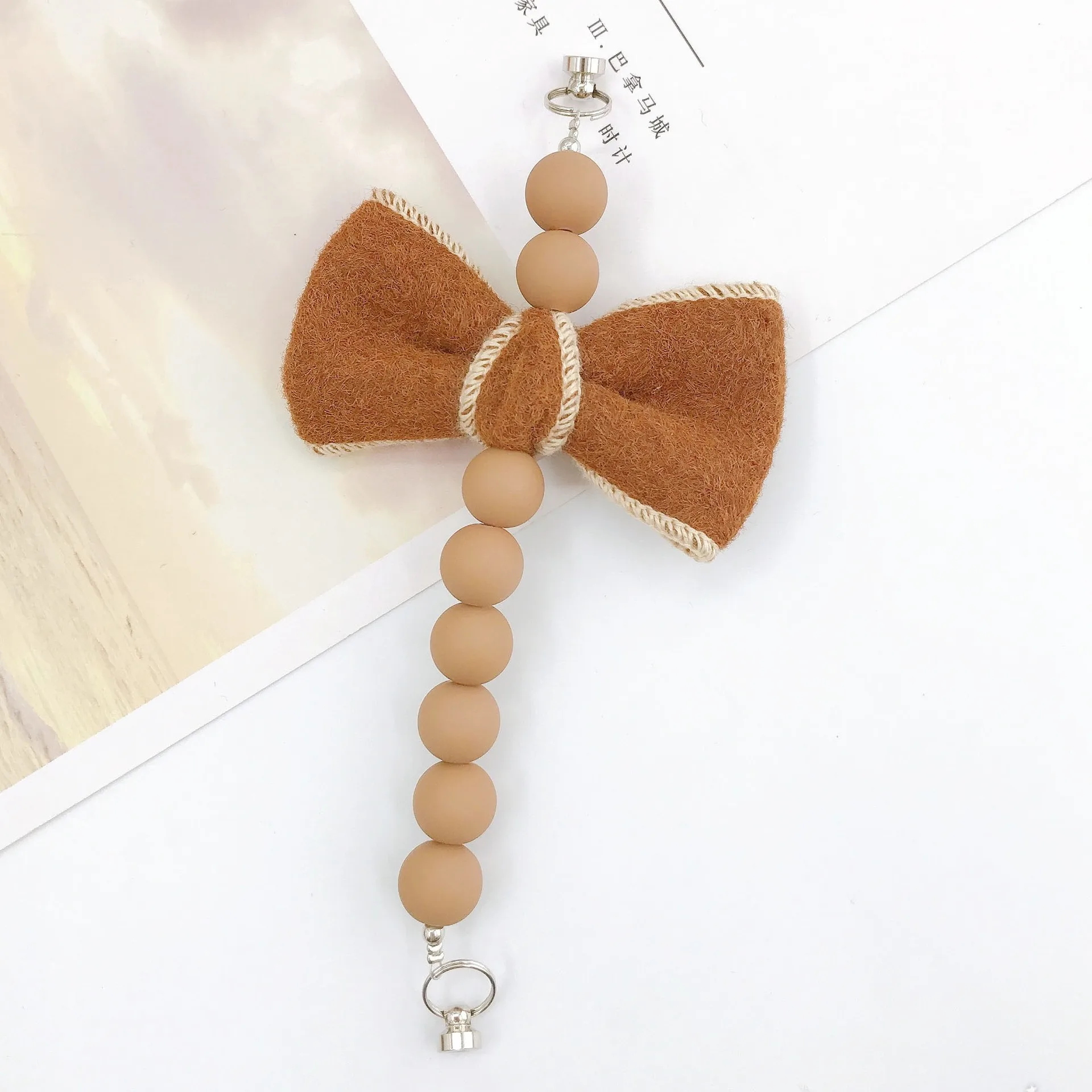 Sweet Bow Knot Arylic Spray Paint Mobile Phone Chain display picture 7