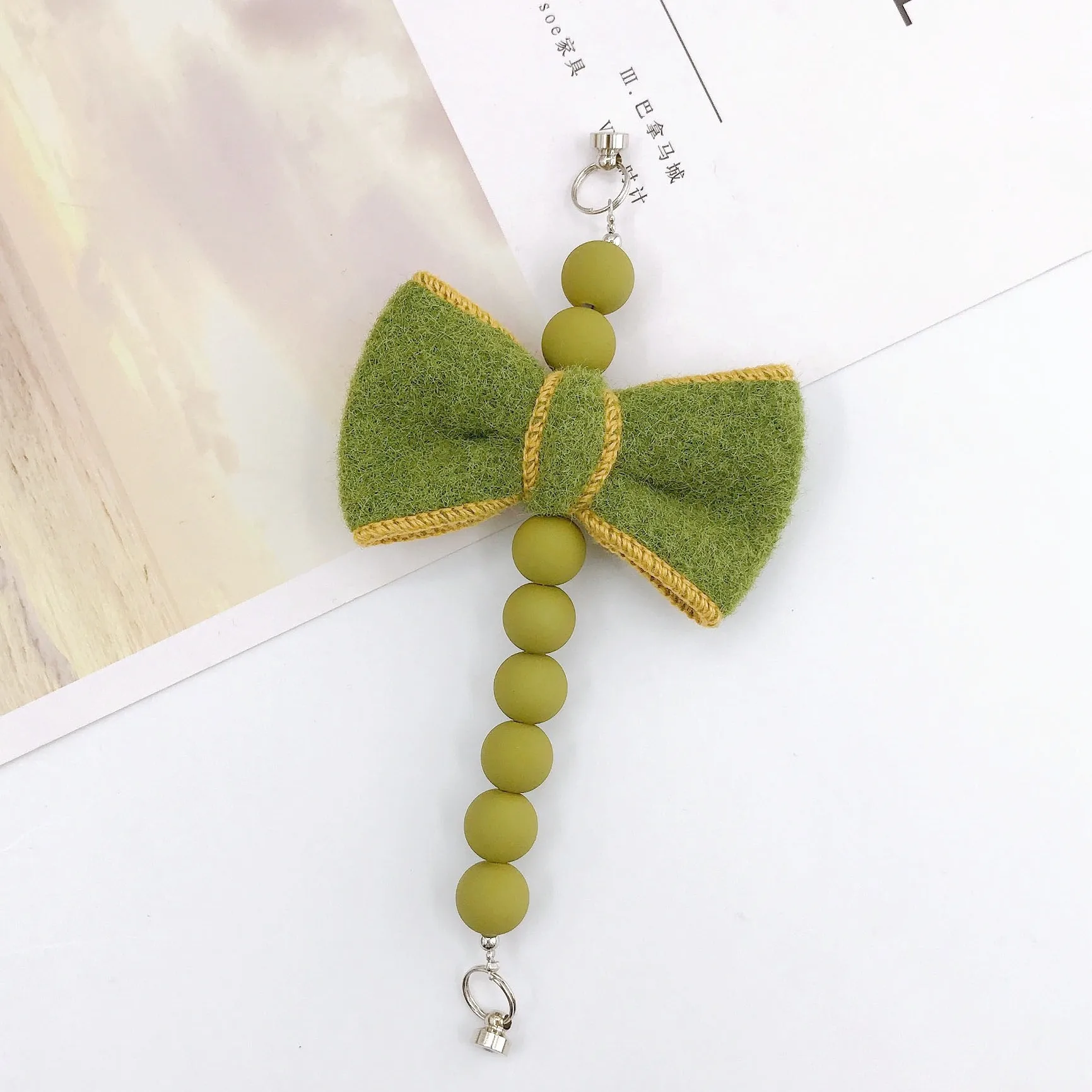 Sweet Bow Knot Arylic Spray Paint Mobile Phone Chain display picture 8
