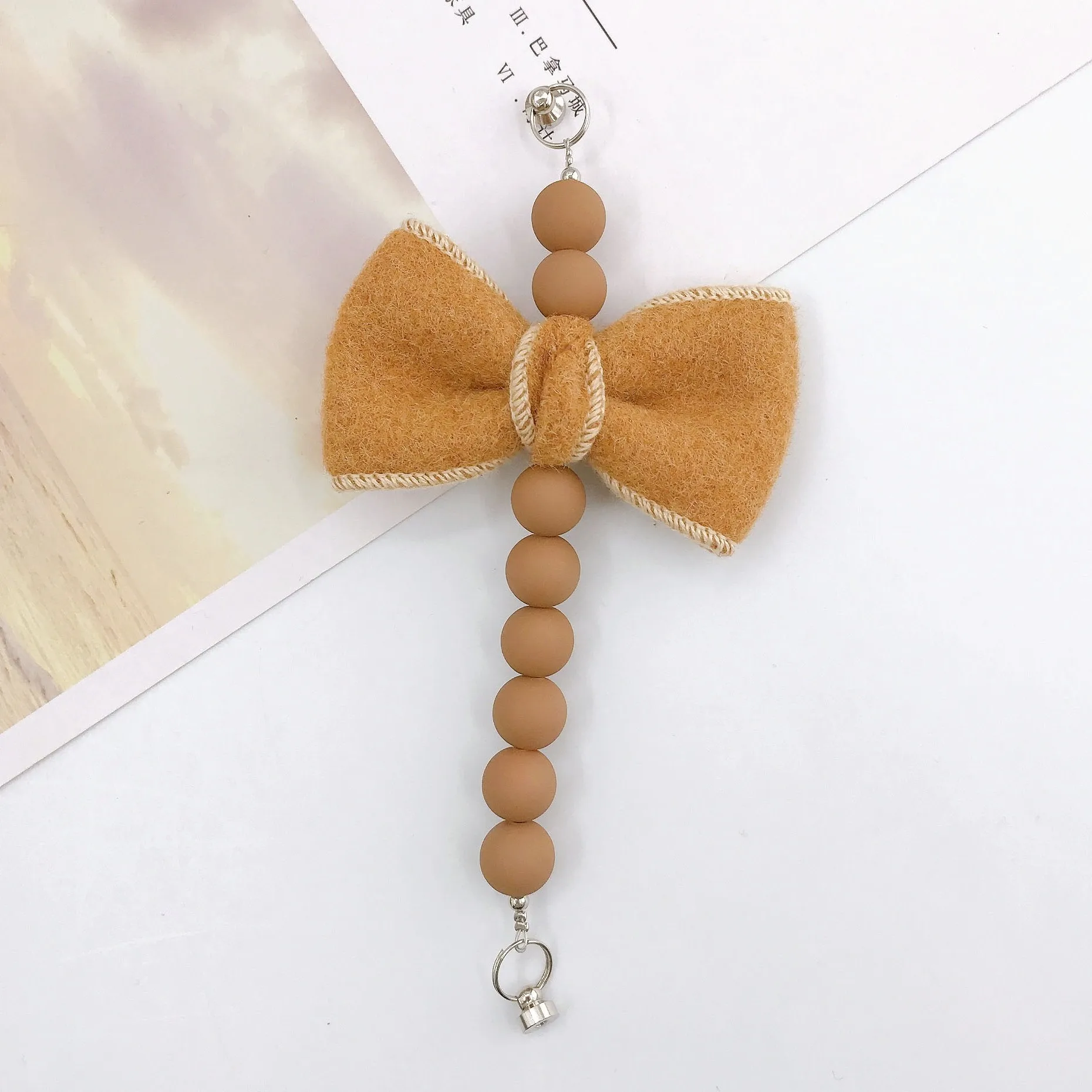 Sweet Bow Knot Arylic Spray Paint Mobile Phone Chain display picture 9