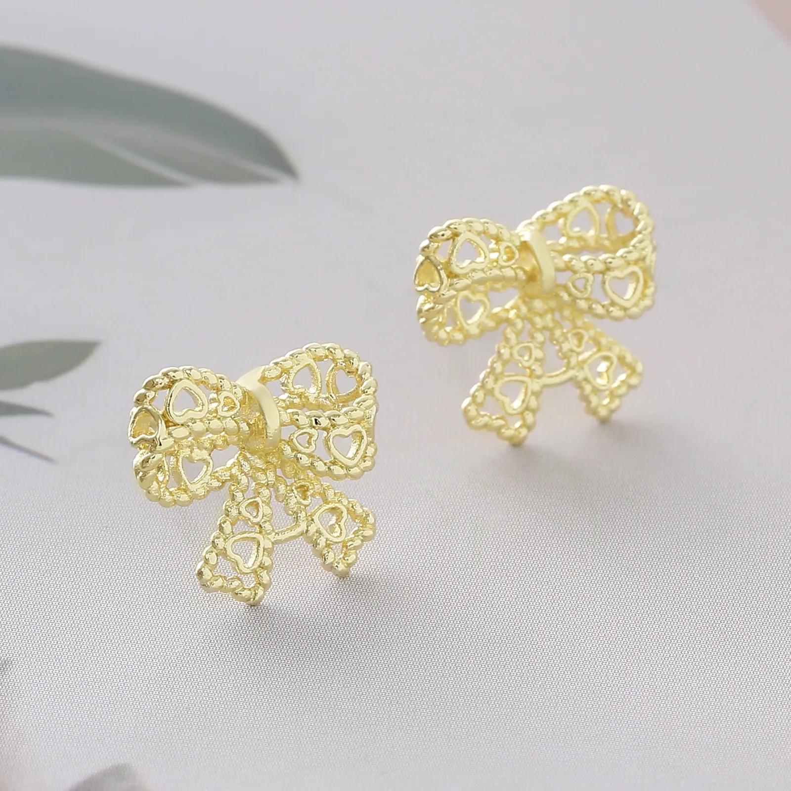 1 Pair Elegant Simple Style Letter Bow Knot Copper Ear Studs display picture 2