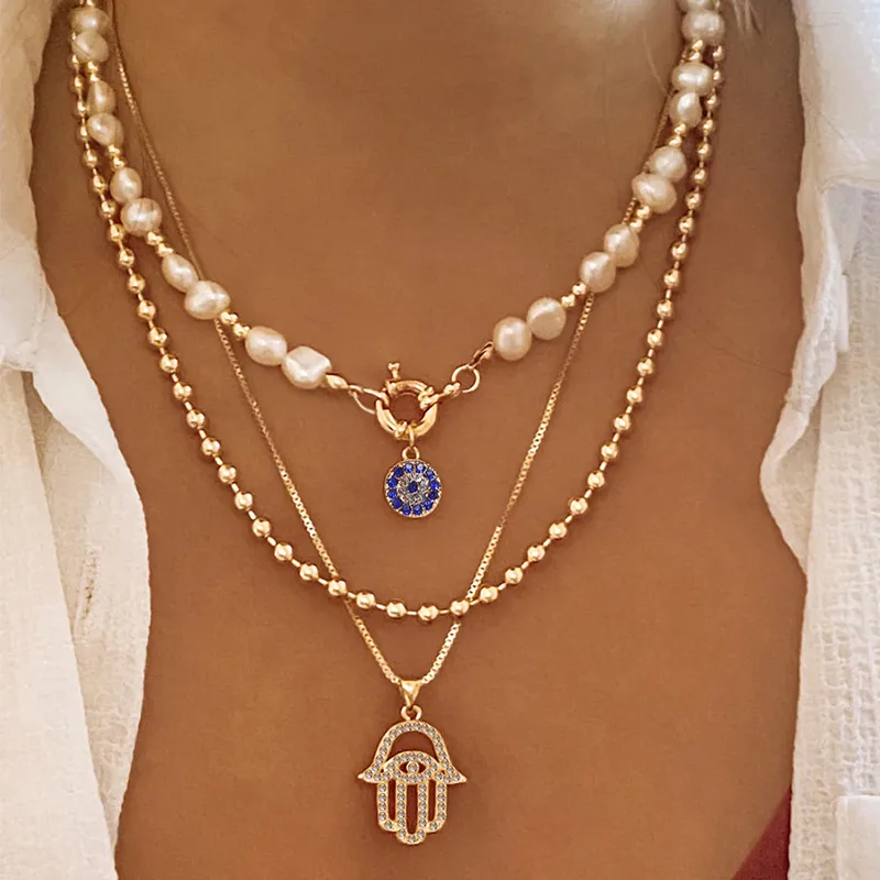 Elegant Glam Vintage Style Round Heart Shape Eye Imitation Pearl Alloy Women's Layered Necklaces Pendant Necklace display picture 2