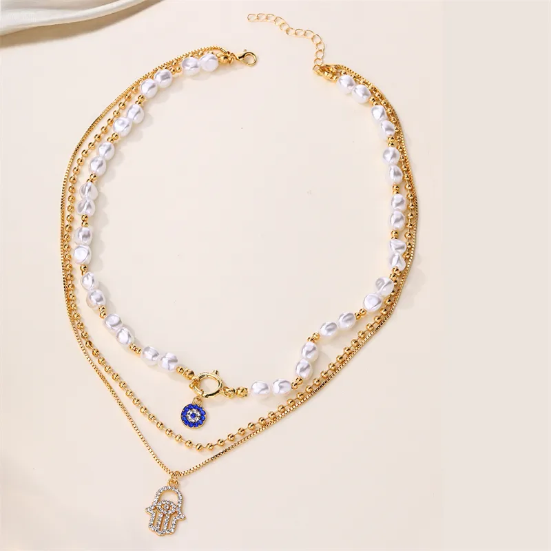 Elegant Glam Vintage Style Round Heart Shape Eye Imitation Pearl Alloy Women's Layered Necklaces Pendant Necklace display picture 3