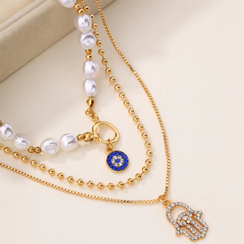 Elegant Glam Vintage Style Round Heart Shape Eye Imitation Pearl Alloy Women's Layered Necklaces Pendant Necklace display picture 4