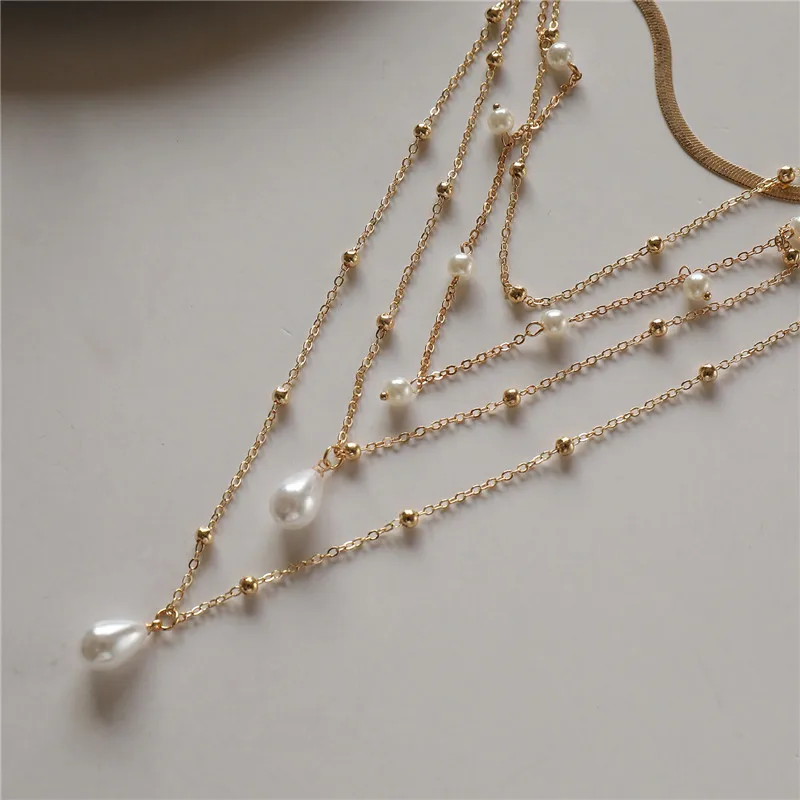 Elegant Glam Vintage Style Round Heart Shape Eye Imitation Pearl Alloy Women's Layered Necklaces Pendant Necklace display picture 9