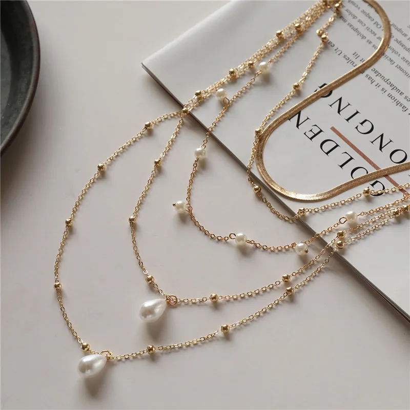 Elegant Glam Vintage Style Round Heart Shape Eye Imitation Pearl Alloy Women's Layered Necklaces Pendant Necklace display picture 10