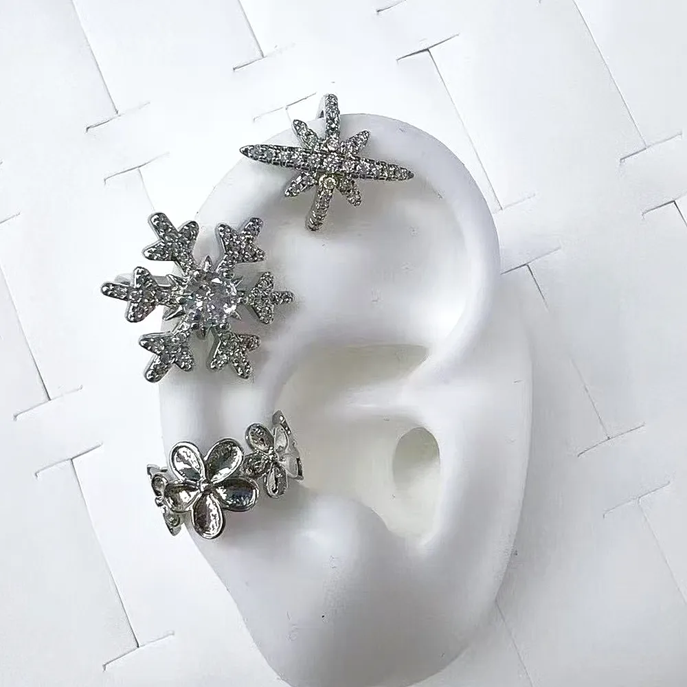1 Pair/Package Modern Style Simple Style Eight Awn Star Flower Snowflake Polishing Plating Copper Zircon White Gold Plated Ear Cuffs display picture 1