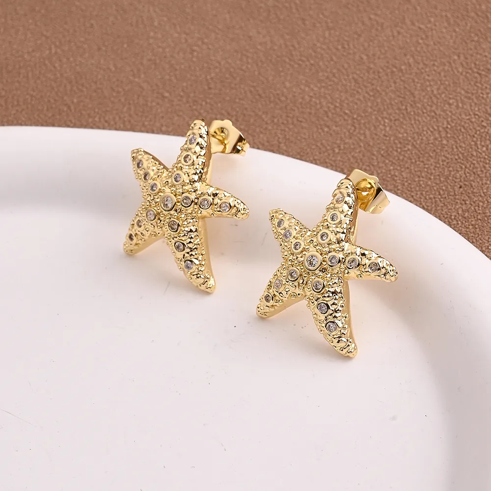 1 Pair/Package Casual Marine Style Modern Style Starfish Flower Polishing Plating Copper Zircon 18K Gold Plated Earrings display picture 2