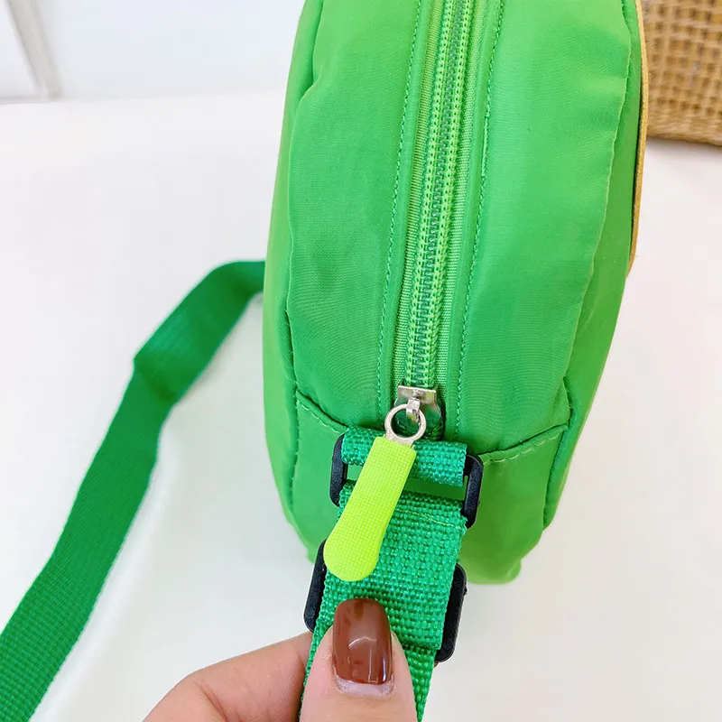 Kid'S Nylon Cartoon Dinosaur Cute Oval Zipper Crossbody Bag display picture 59