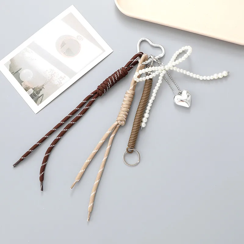 New Miu Bag Hanging Bow Love Keychain Pendant Personalized All-match Braided Rope Mobile Phone Pendant display picture 4