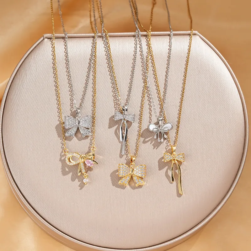 Vacation Classic Style Bow Knot Titanium Steel Copper Bowknot Inlaid Zircon Women's Pendant Necklace display picture 8
