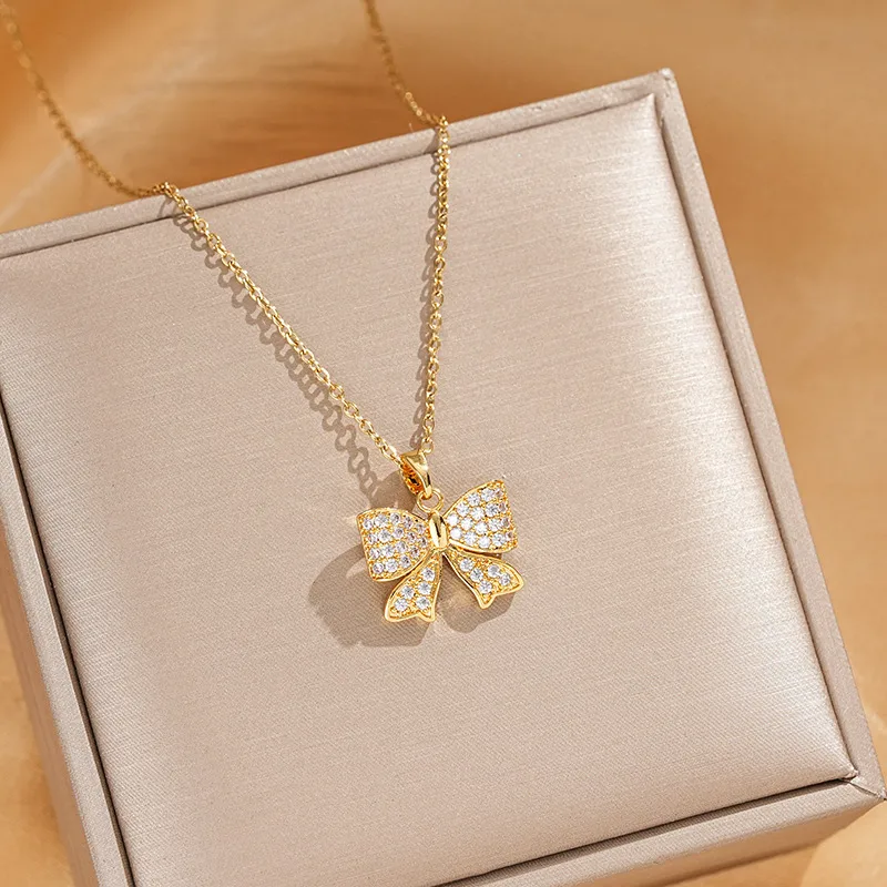 Vacation Classic Style Bow Knot Titanium Steel Copper Bowknot Inlaid Zircon Women's Pendant Necklace display picture 4