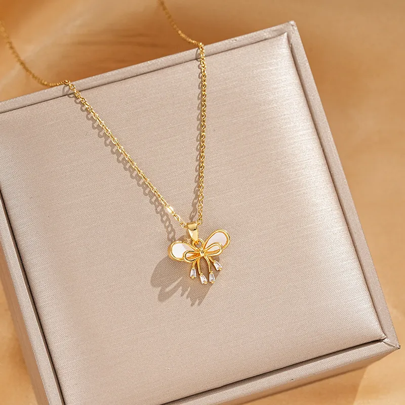 Vacation Classic Style Bow Knot Titanium Steel Copper Bowknot Inlaid Zircon Women's Pendant Necklace display picture 6