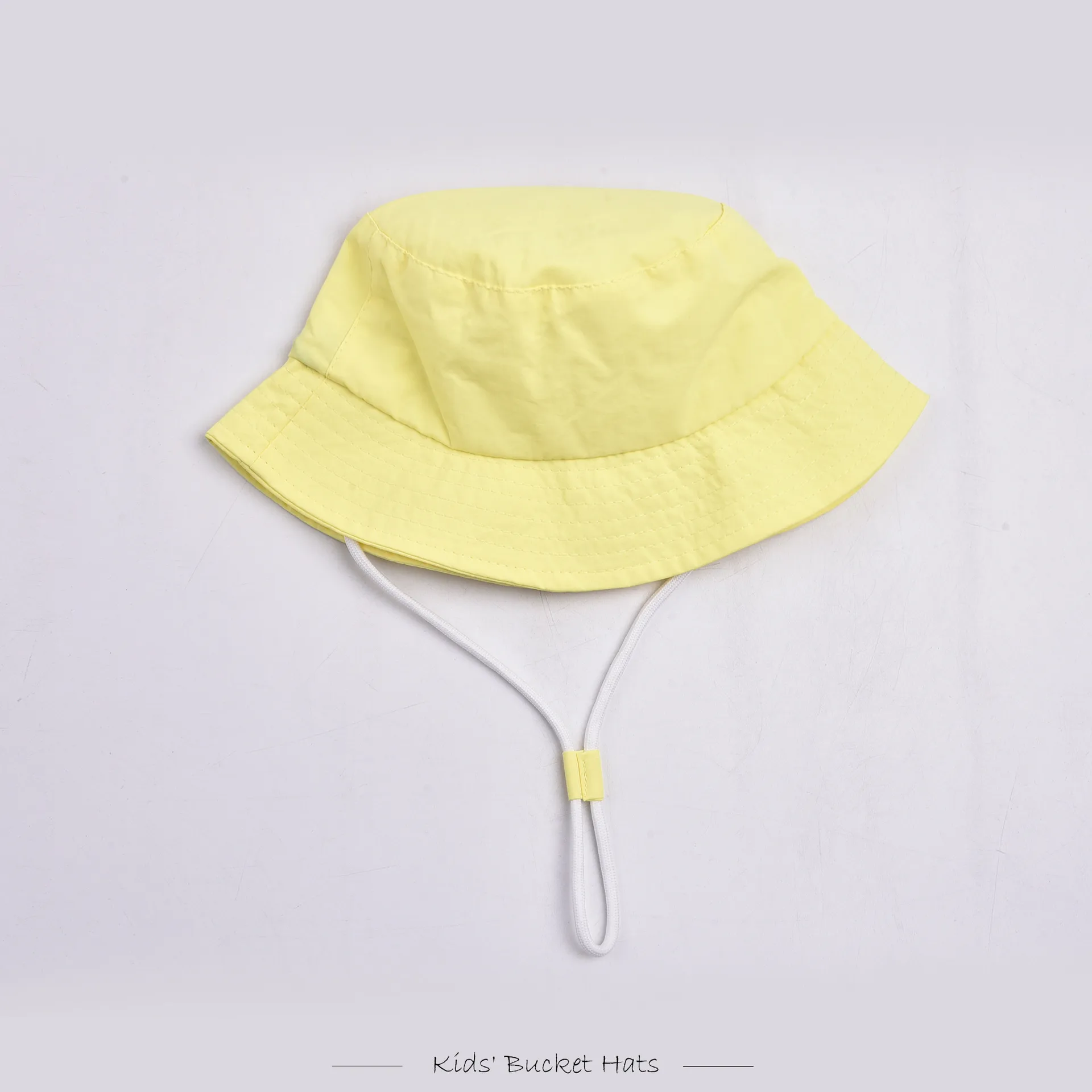 Children Unisex Cute Pastoral Solid Color Drawstring Bucket Hat display picture 18