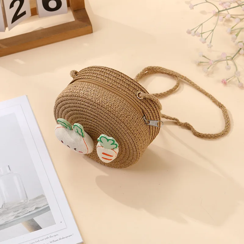 Summer Girls Woven Seaside Bag  New Cute Rabbit Straw Bag Beach Children Crossbody Small Round Bag display picture 16
