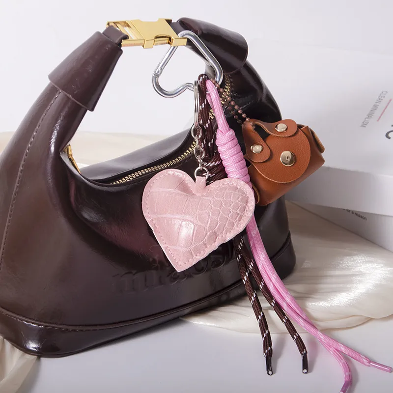MIU Department Light Luxury Crocodile Pattern Love Bag Pendant Five-pointed Star Flower Woven Hand Rope Bag Accessories Wholesale Factory display picture 3