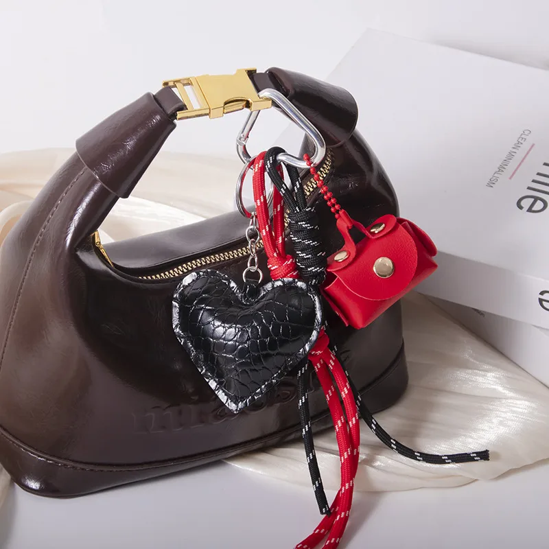 MIU Department Light Luxury Crocodile Pattern Love Bag Pendant Five-pointed Star Flower Woven Hand Rope Bag Accessories Wholesale Factory display picture 4