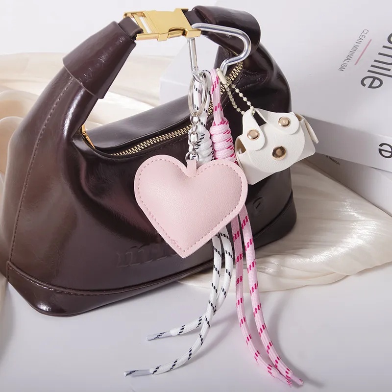 MIU Department Light Luxury Crocodile Pattern Love Bag Pendant Five-pointed Star Flower Woven Hand Rope Bag Accessories Wholesale Factory display picture 6