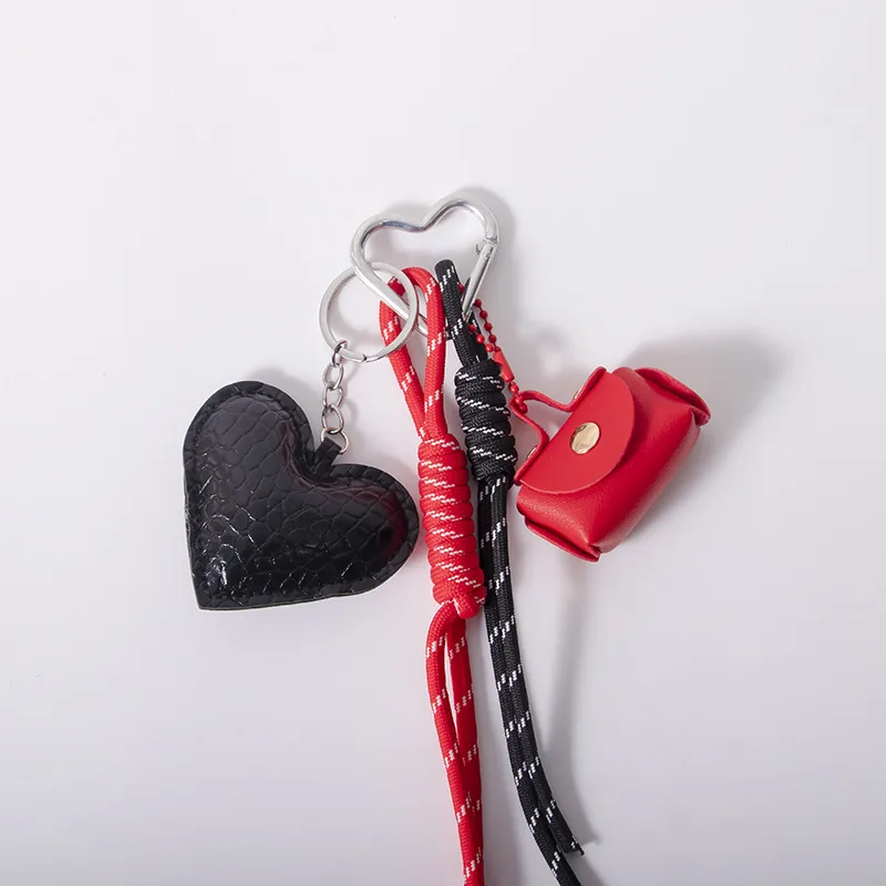 MIU Department Light Luxury Crocodile Pattern Love Bag Pendant Five-pointed Star Flower Woven Hand Rope Bag Accessories Wholesale Factory display picture 10