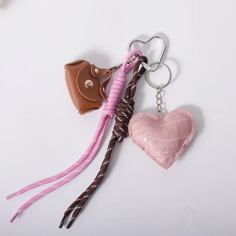 MIU Department Light Luxury Crocodile Pattern Love Bag Pendant Five-pointed Star Flower Woven Hand Rope Bag Accessories Wholesale Factory display picture 13