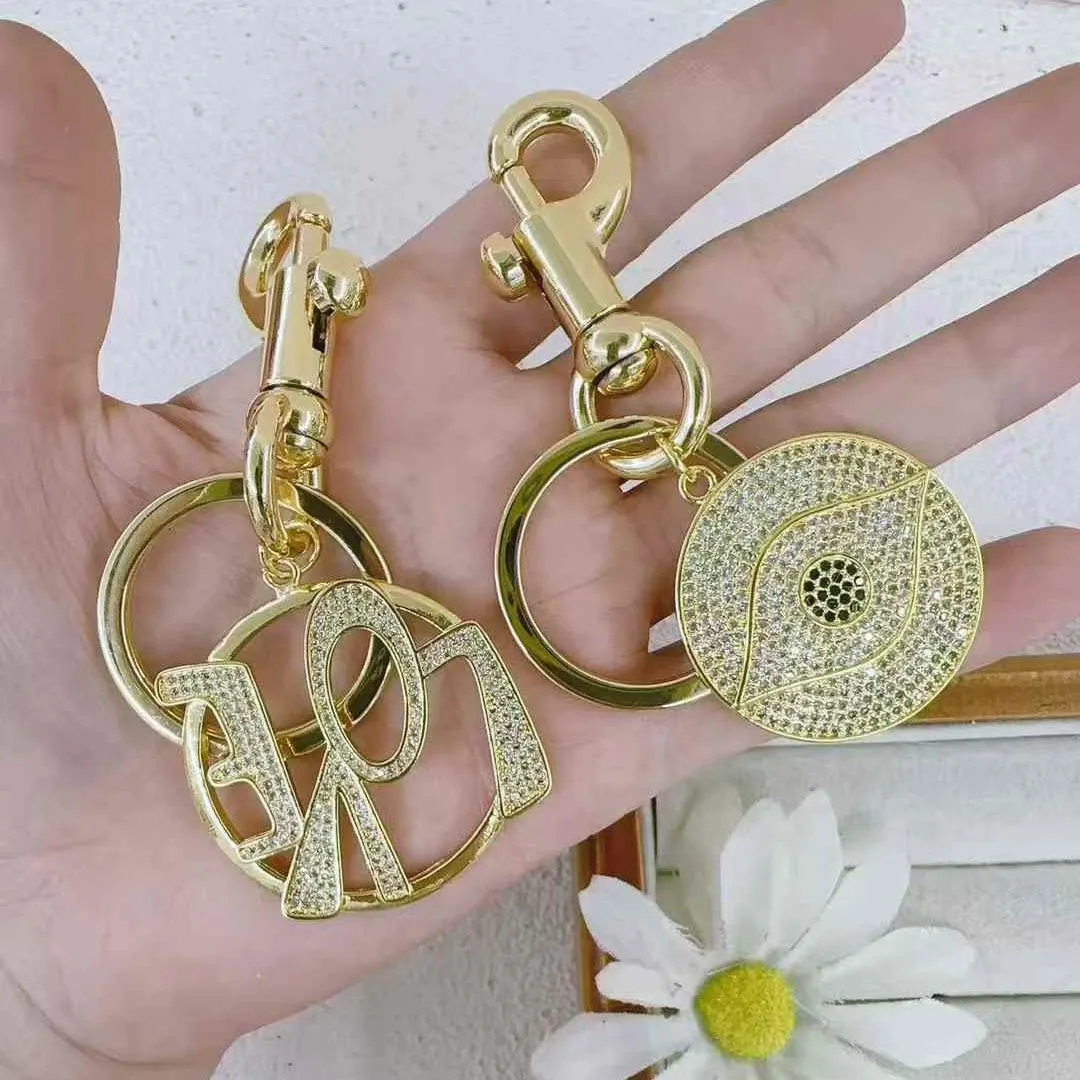 1 Pc/Package Modern Style Simple Style Vocabulary Words/Name Sun Eye Copper Polishing Plating Inlay Zircon Unisex Keychain display picture 3