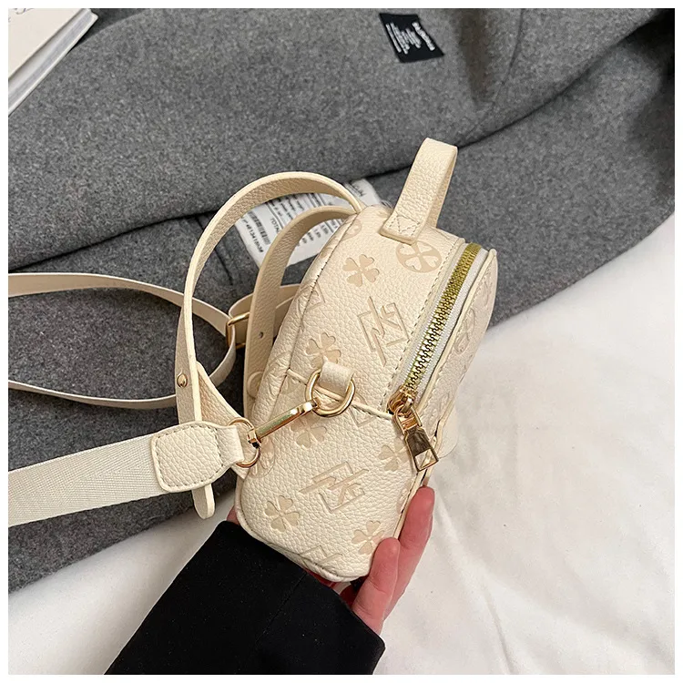 Children's Bag All-match Retro Fashionable Simple Portable Bucket Bag New Style Niche Wide Shoulder Strap Mini Crossbody Small Bag display picture 5