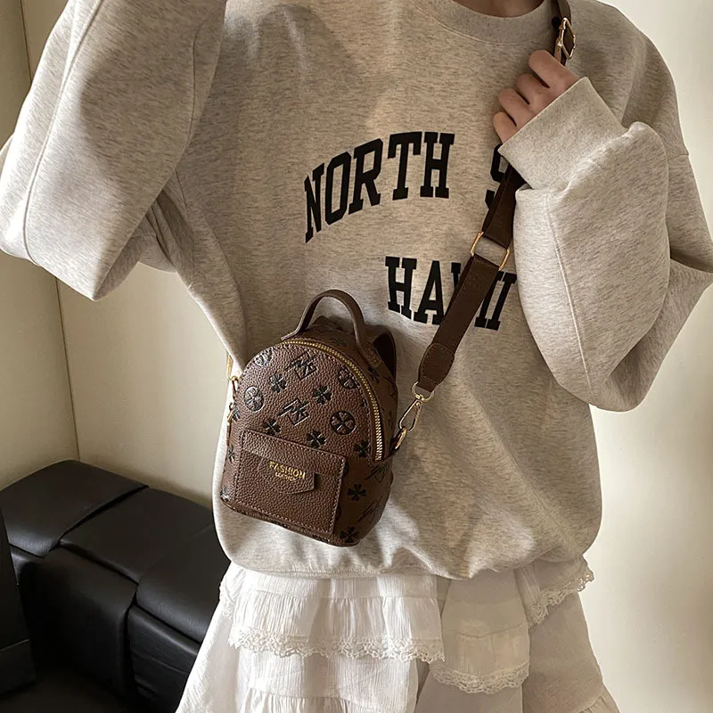 Children's Bag All-match Retro Fashionable Simple Portable Bucket Bag New Style Niche Wide Shoulder Strap Mini Crossbody Small Bag display picture 25