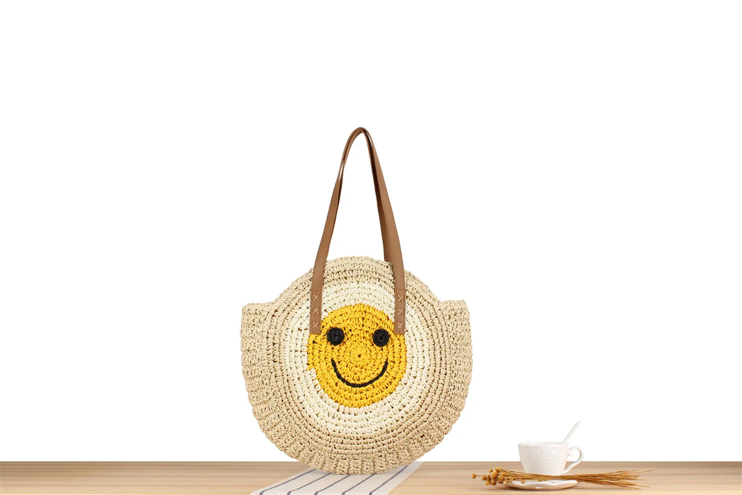 A Generation Of New Simple Smiley Face Shoulder Straw Bag Paper Rope Hollow Hand Woven Bag Large Capacity Disc Bag display picture 2