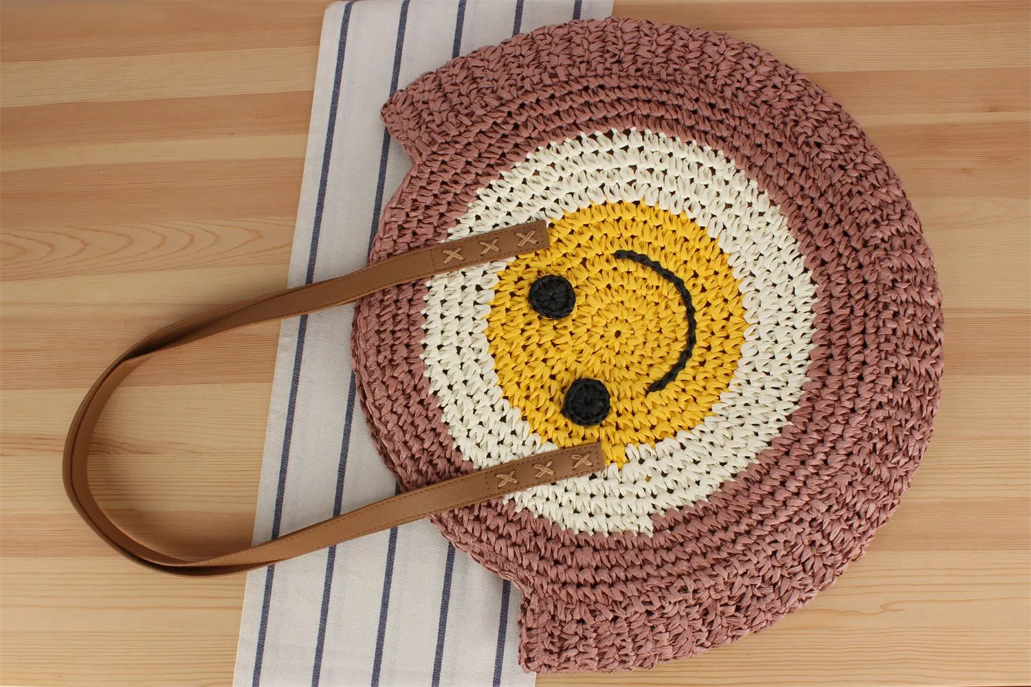 A Generation Of New Simple Smiley Face Shoulder Straw Bag Paper Rope Hollow Hand Woven Bag Large Capacity Disc Bag display picture 8