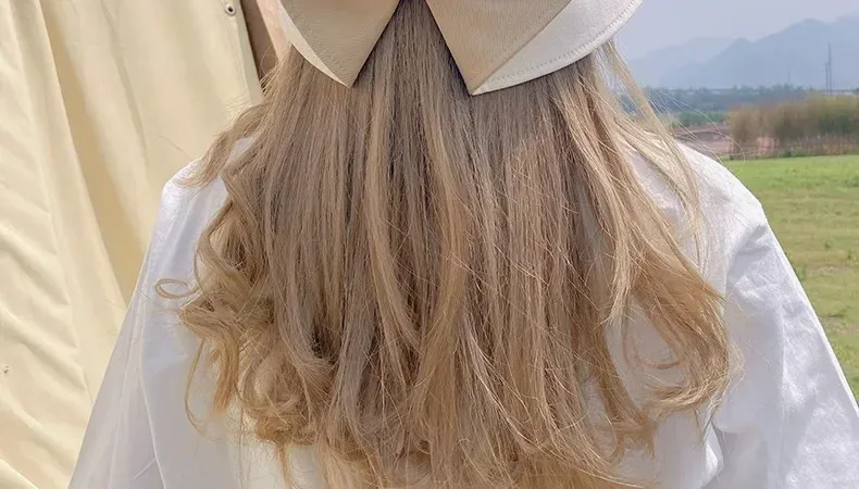 New Fisherman Hat Sunshade Sunscreen Tide Brand Face Showing Small Bucket Hat Women's New-style Early Spring And Autumn Split Bow Hat display picture 9