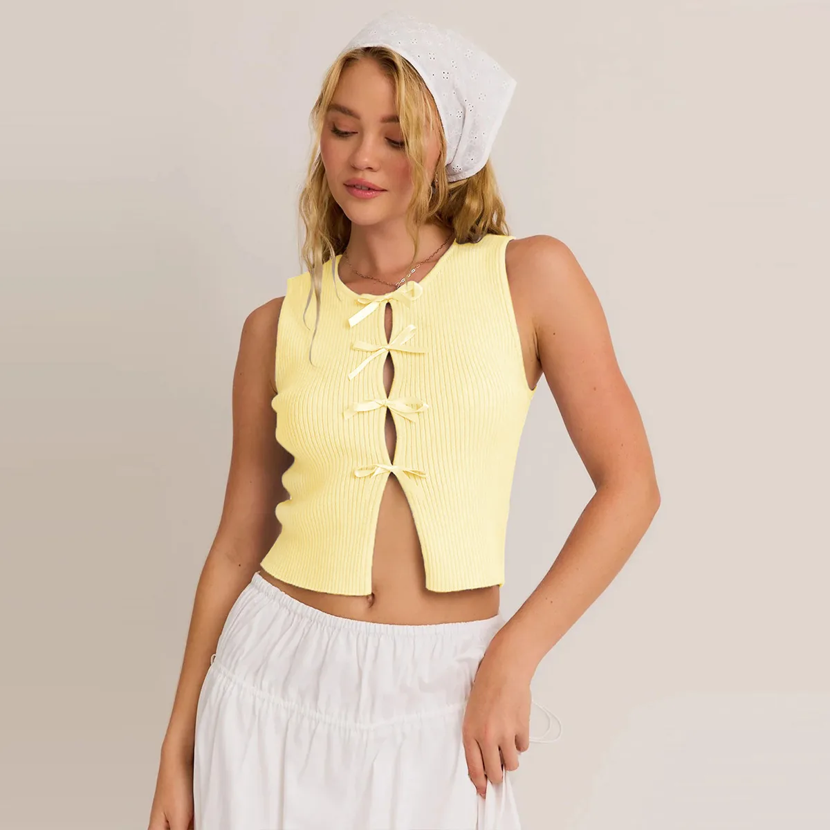 Designed Foreign Trade  Spring And Summer New Hot Bow Decoration Hollow Solid Color Round Neck Slim Vest Top display picture 35