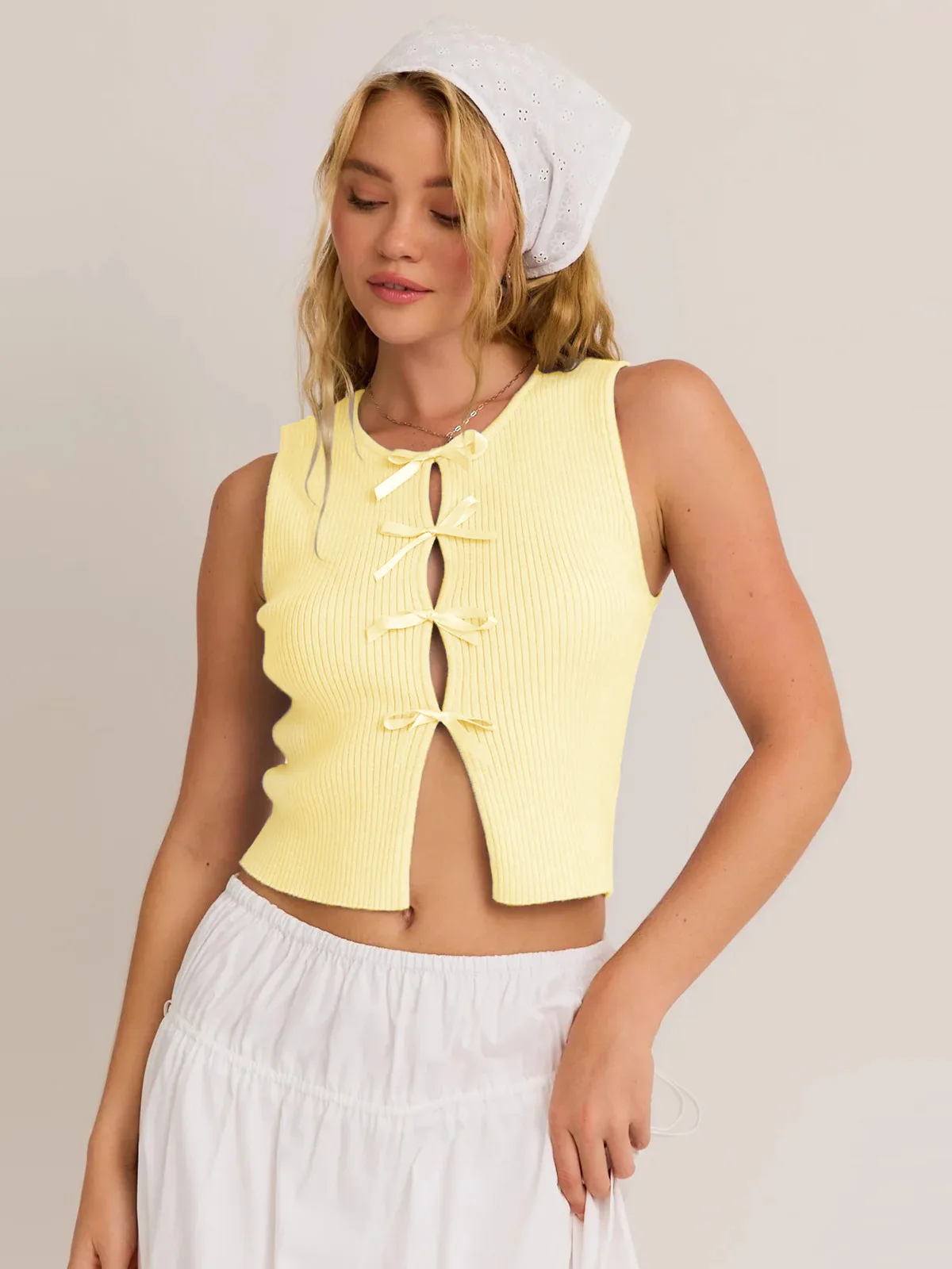 Designed Foreign Trade  Spring And Summer New Hot Bow Decoration Hollow Solid Color Round Neck Slim Vest Top display picture 36