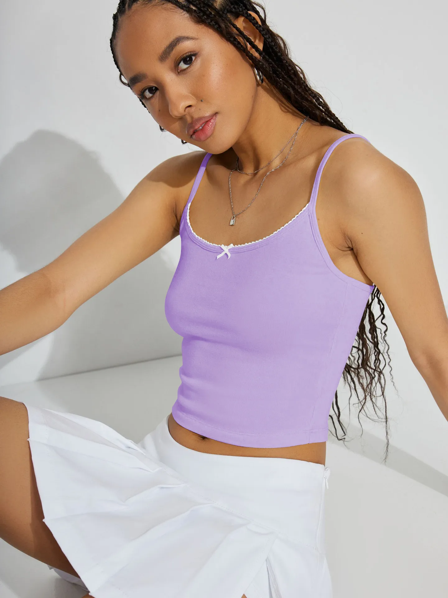 Spring And Summer  Women's Bow Decoration Sexy Low Collar Backless Solid Color Sling Navel Ins Style Short Vest display picture 11