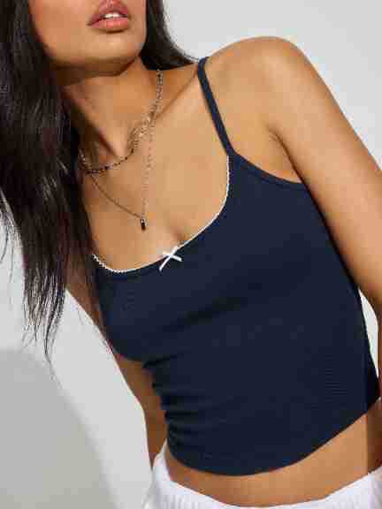 Spring And Summer  Women's Bow Decoration Sexy Low Collar Backless Solid Color Sling Navel Ins Style Short Vest display picture 18