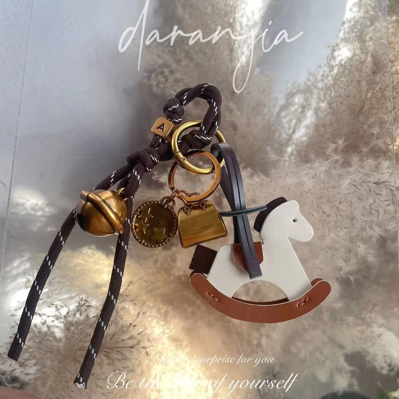 New Diy Bell Braided Rope Rocking Horse Bag Ornaments Exquisite Bag Decoration Miu Series Explosive Key Chain Pendant display picture 1
