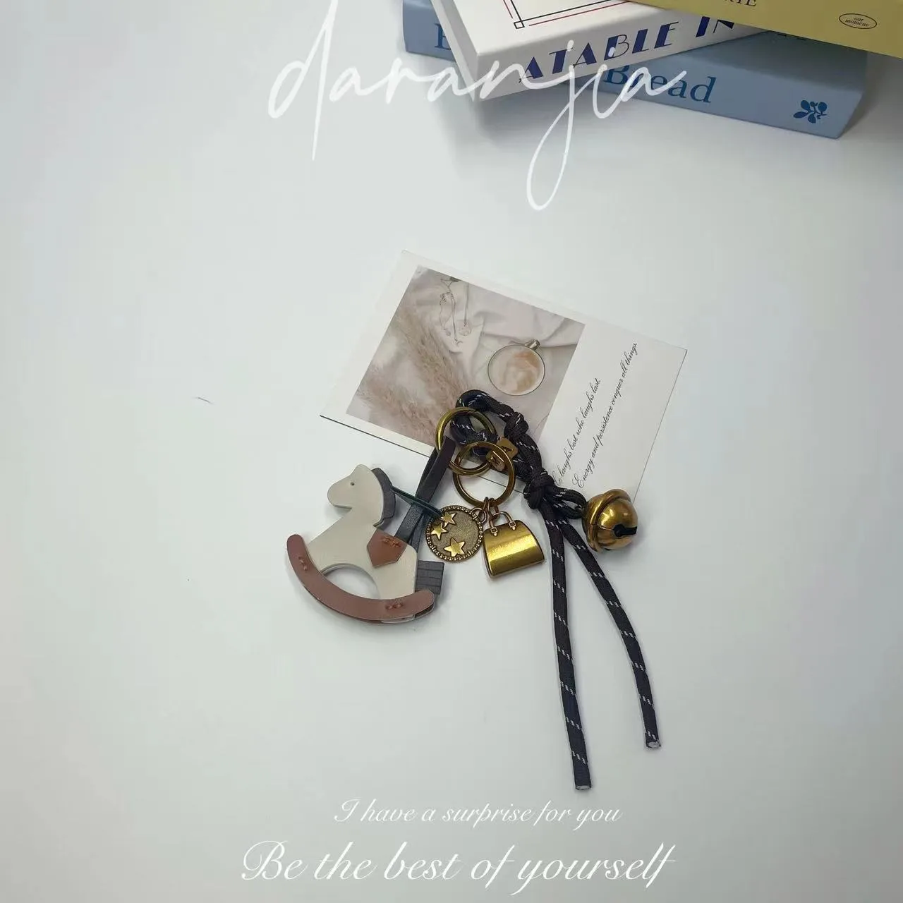 New Diy Bell Braided Rope Rocking Horse Bag Ornaments Exquisite Bag Decoration Miu Series Explosive Key Chain Pendant display picture 5
