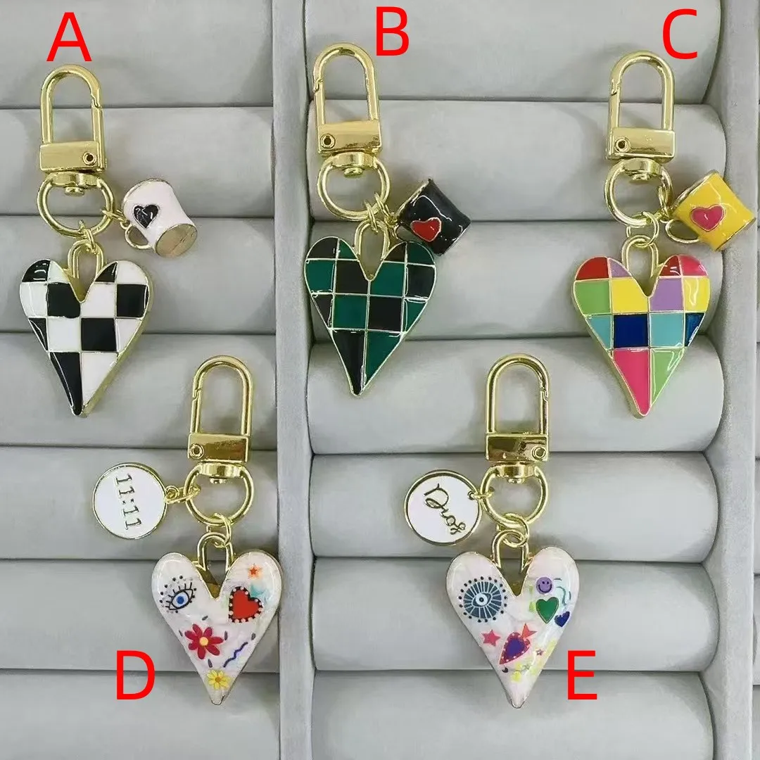 1 Pc/Package Modern Style Cup Lattice Graffiti Copper Polishing Unisex Keychain display picture 2