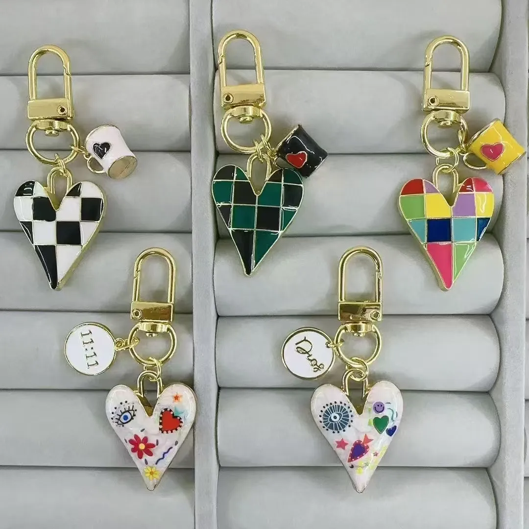 1 Pc/Package Modern Style Cup Lattice Graffiti Copper Polishing Unisex Keychain display picture 1
